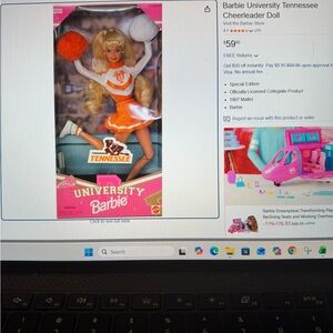 Vintage Barbie Tennessee Cheerleader Doll in Orange and White